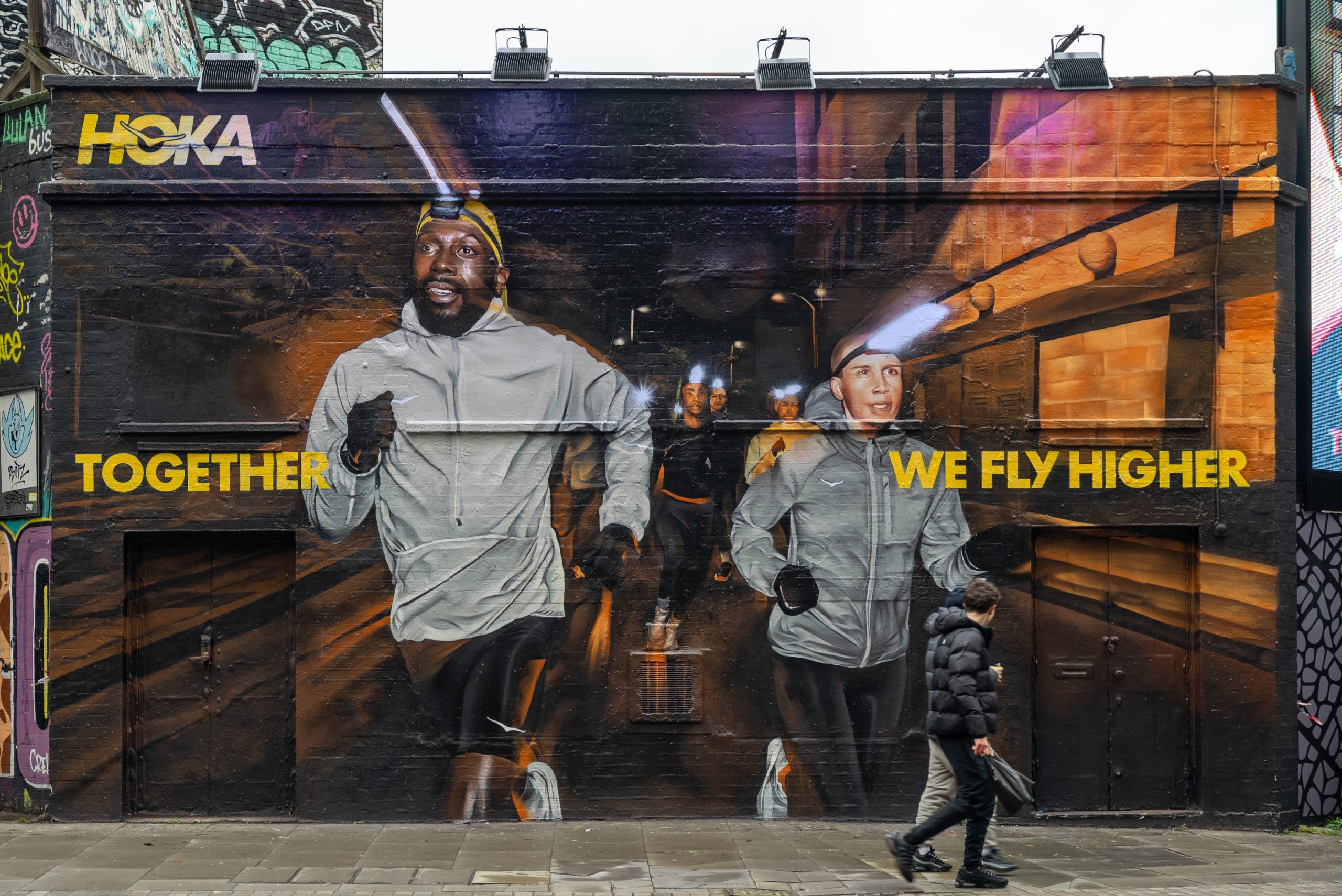 HOKA Illuminates East London with High-Visibility UV Mural